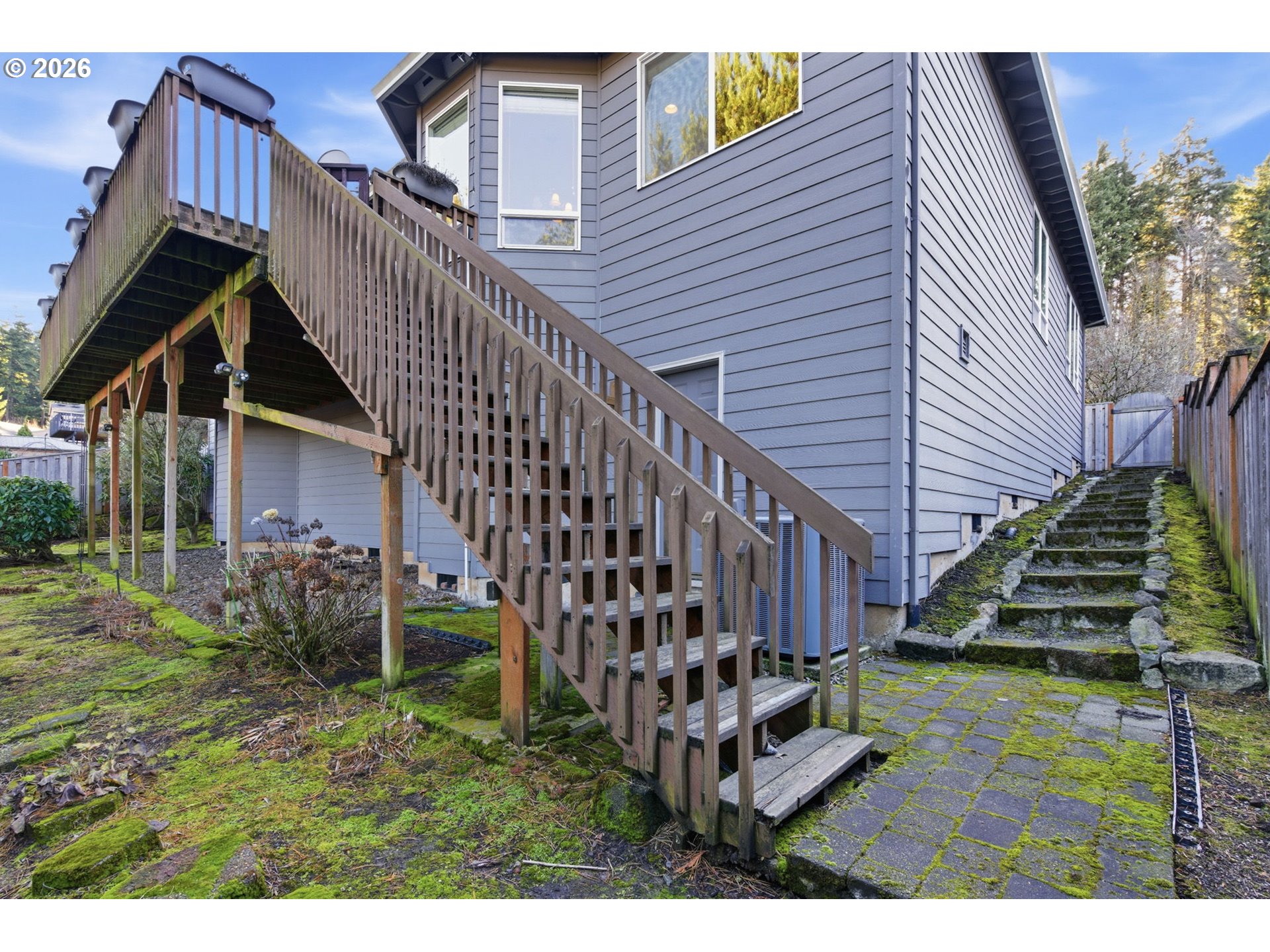 11086 Southeast Rimrock Drive Happy Valley, OR 97086 - Photo 35 of 39 a view of a house with backyard and deck