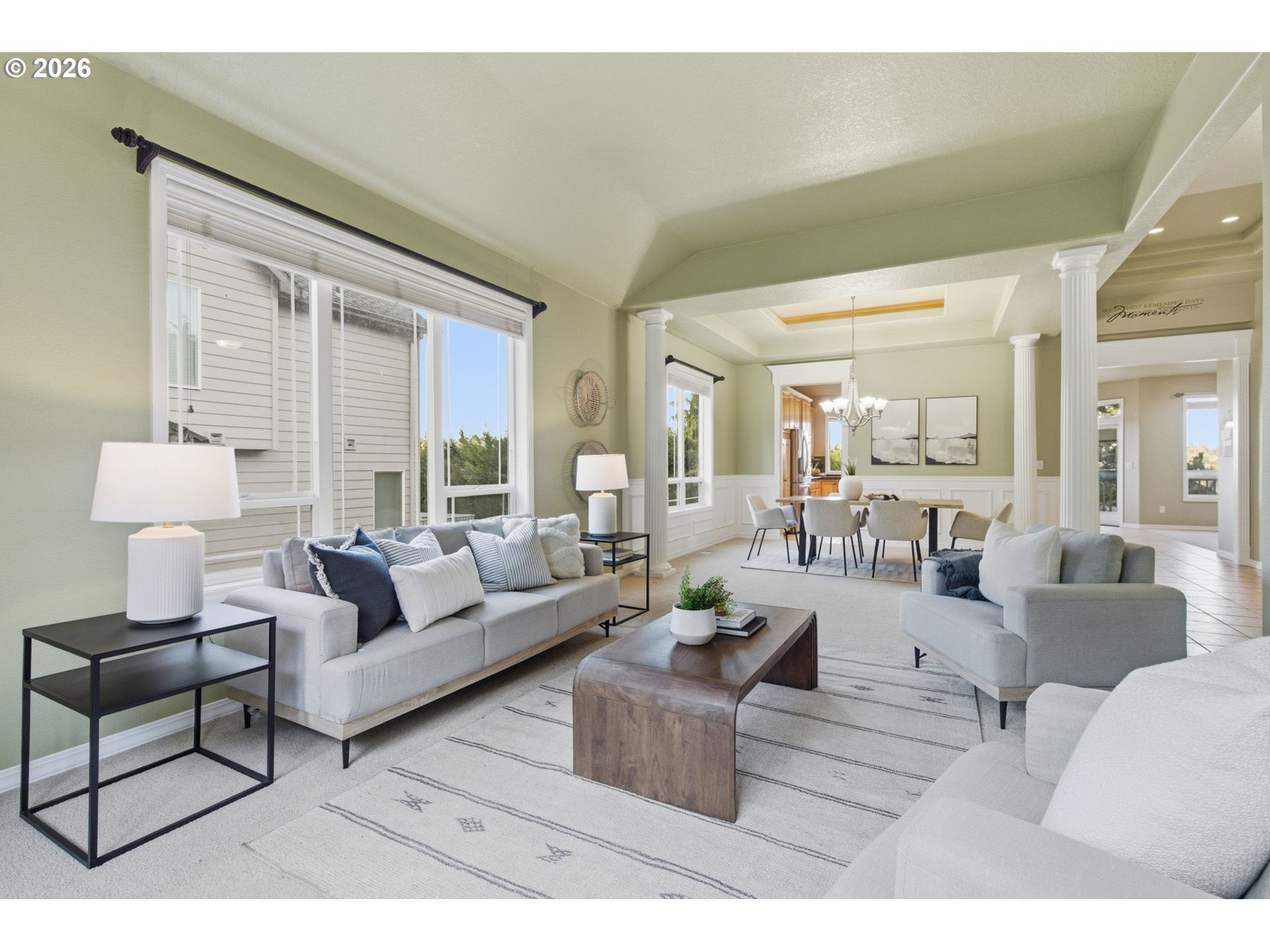 11086 Southeast Rimrock Drive Happy Valley, OR 97086 - Photo 6 of 39 a living room with furniture and a large window