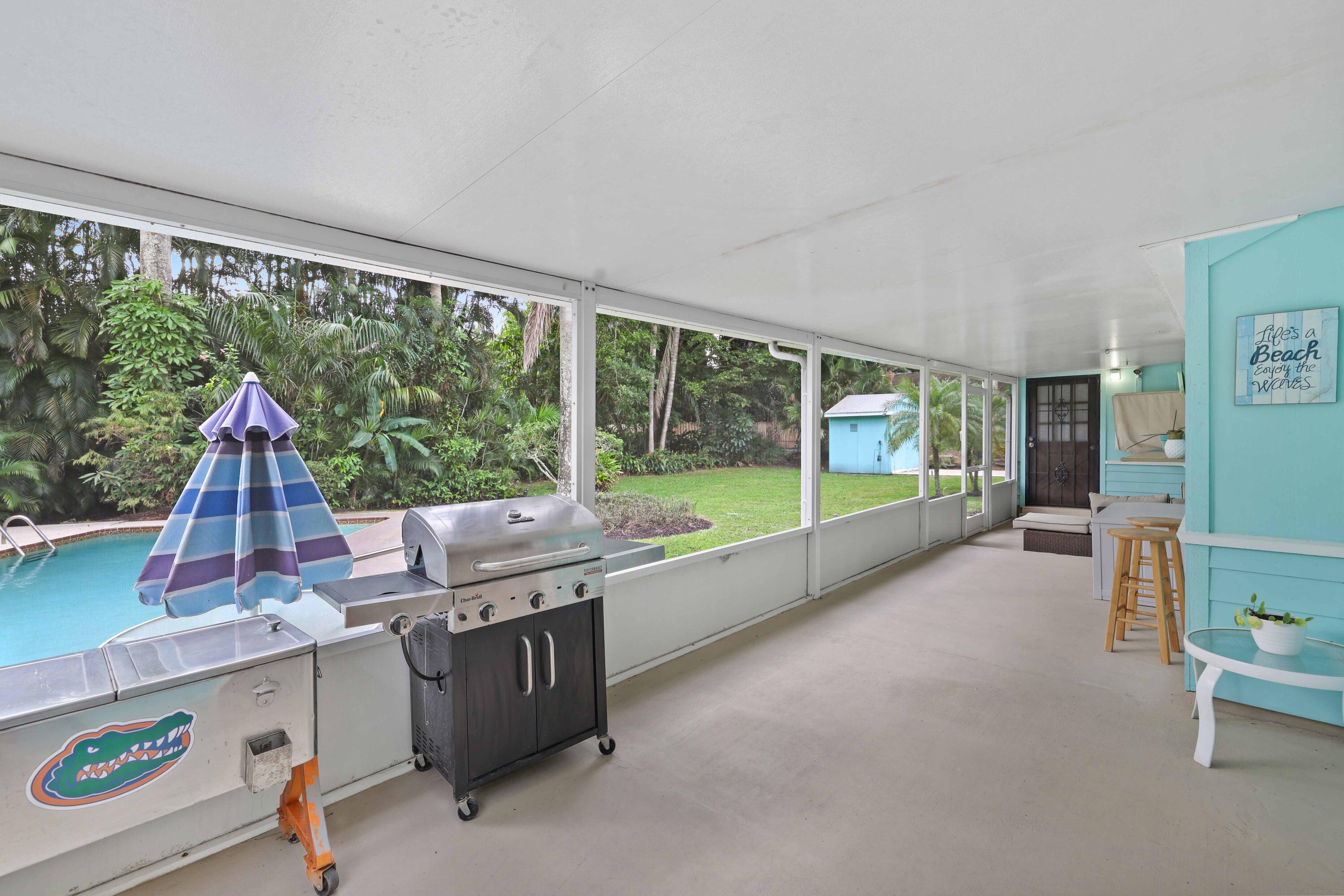 5554 Hibiscus Road Jupiter, FL 33458 - Photo 35 of 66 Screened Patio