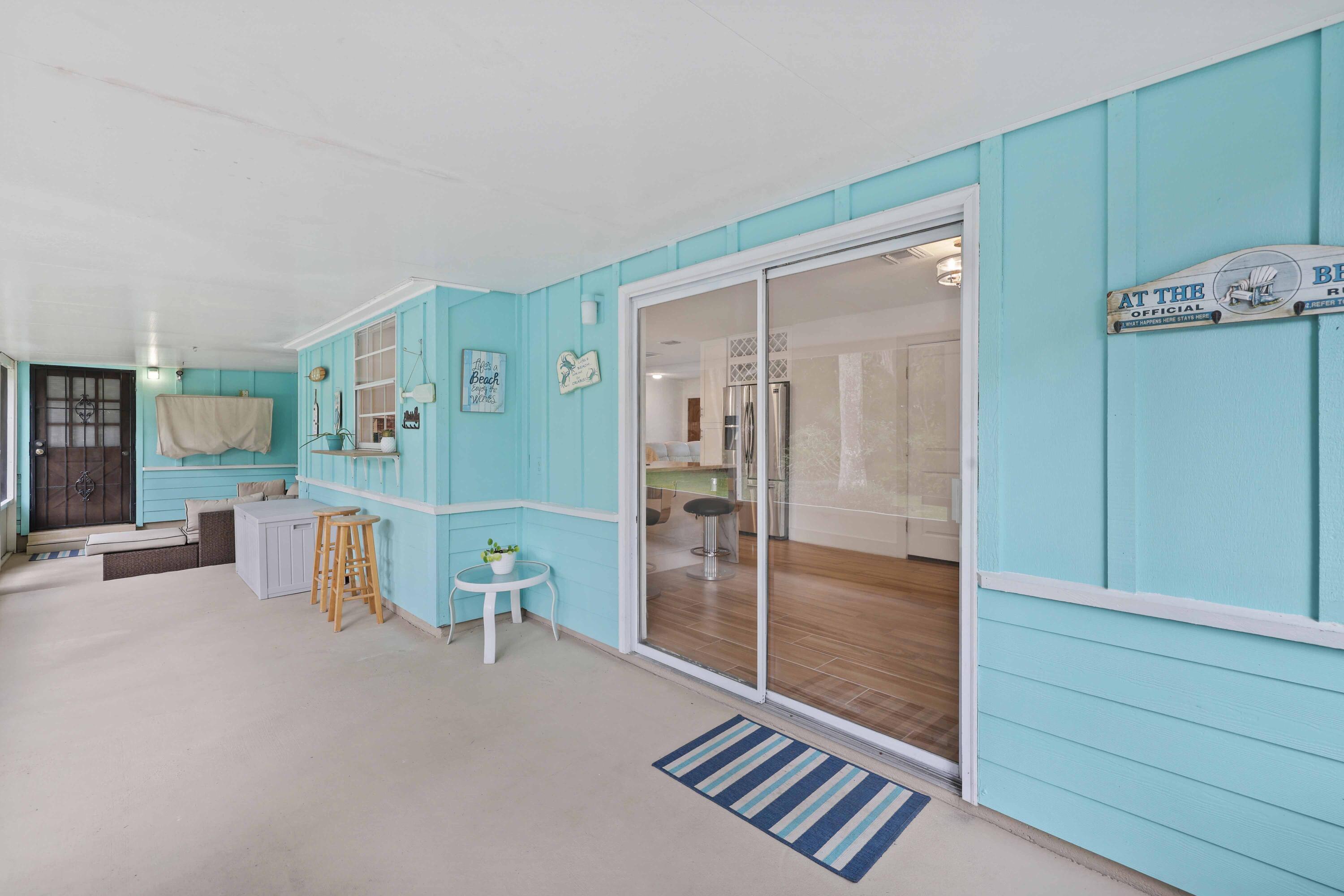 5554 Hibiscus Road Jupiter, FL 33458 - Photo 36 of 66 Screened Patio (Eat in Kitchen Door)