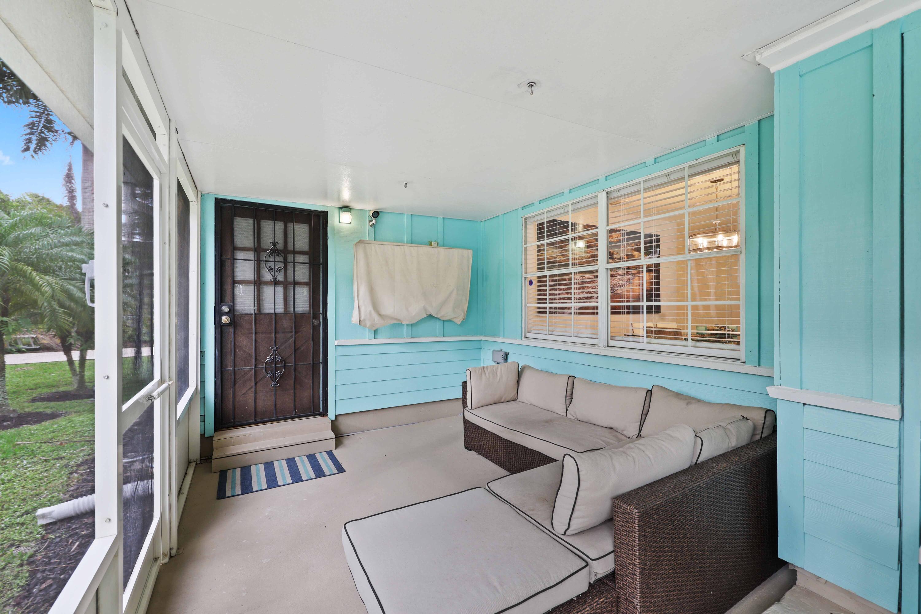 5554 Hibiscus Road Jupiter, FL 33458 - Photo 39 of 66 Screened Patio (Dining Room Window)