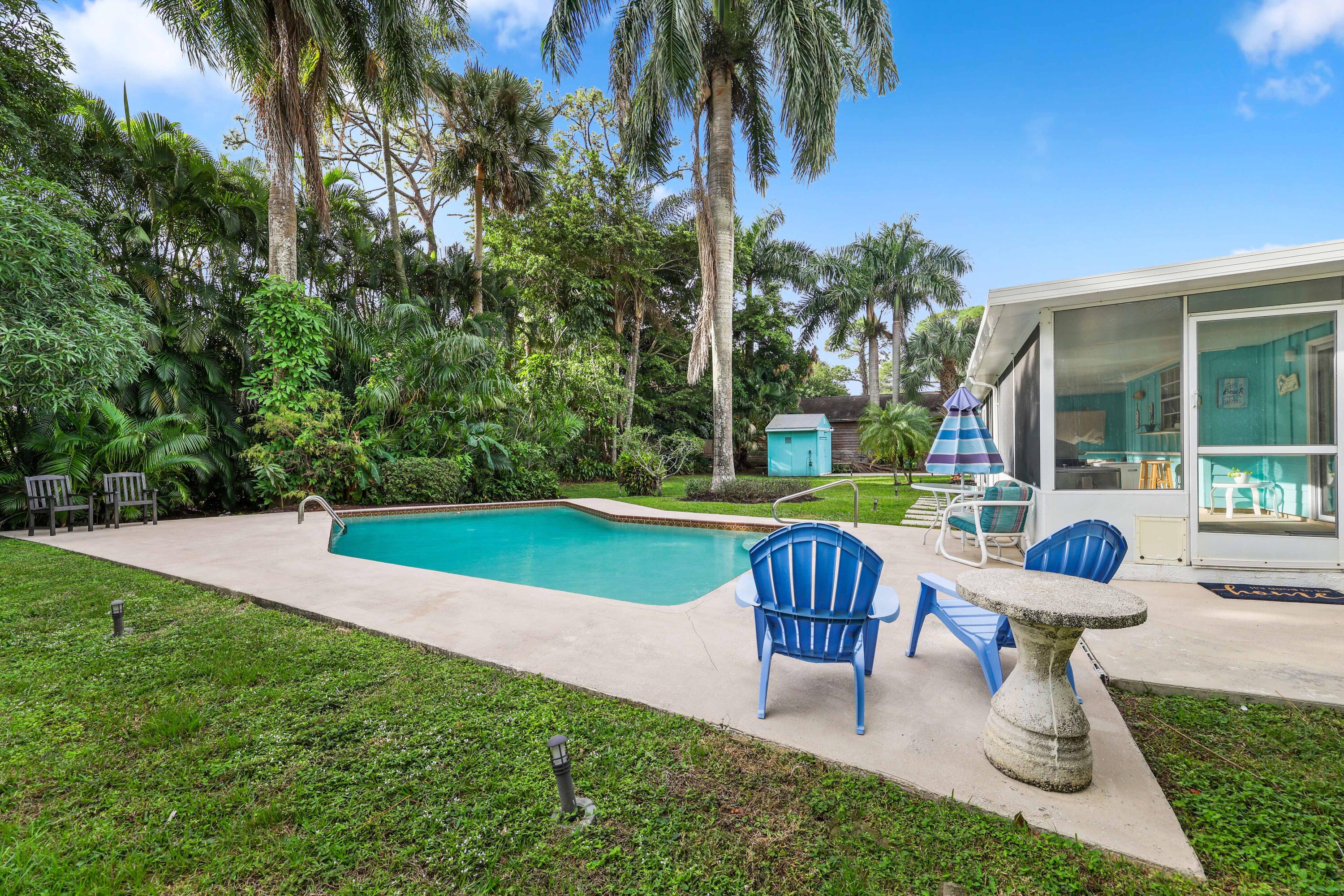 5554 Hibiscus Road Jupiter, FL 33458 - Photo 43 of 66 Pool East Side