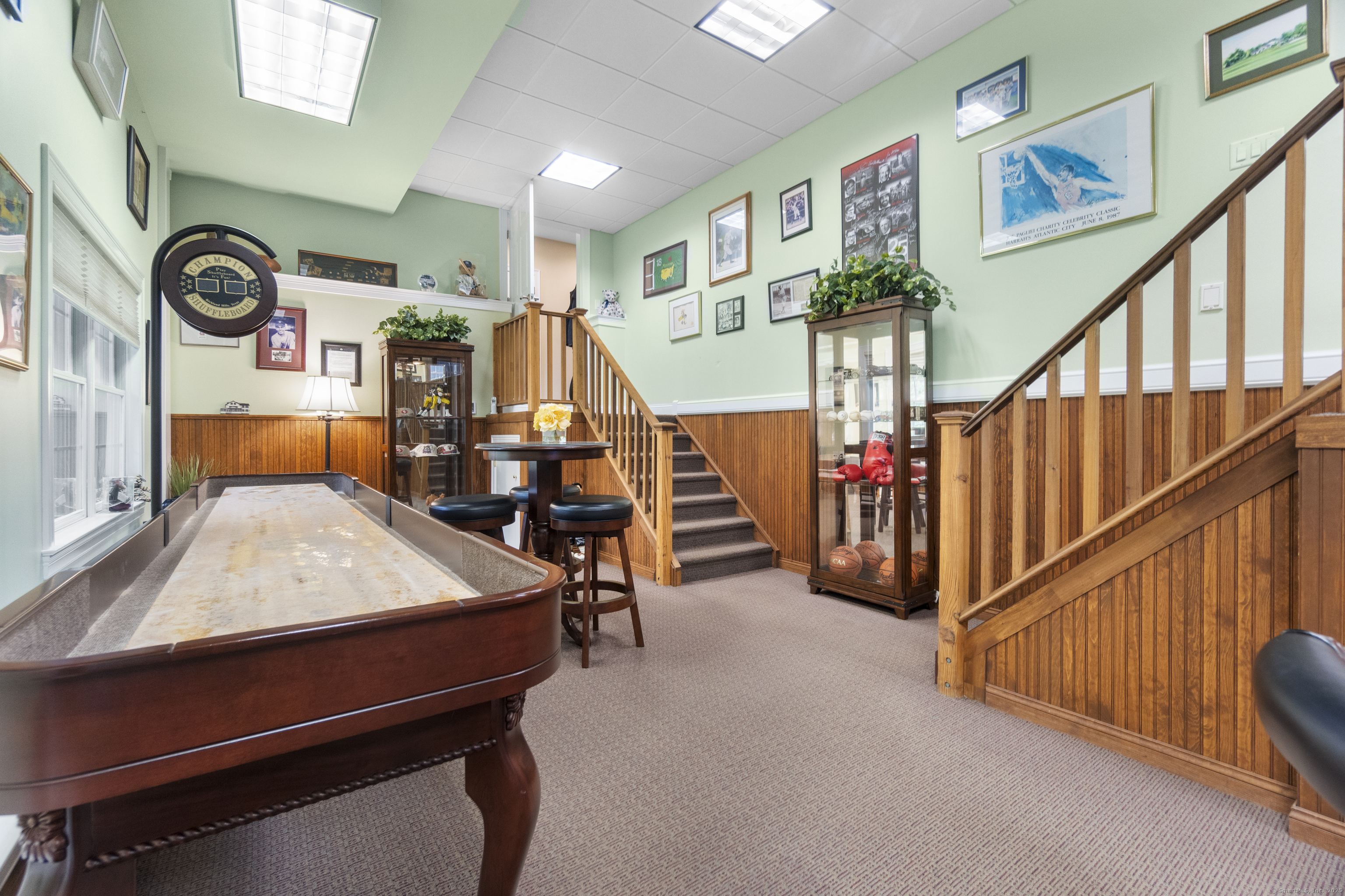 38 Sportsman Hill Road Madison, CT 06443 - Photo 35 of 40 a room with lots of white furniture and stairs