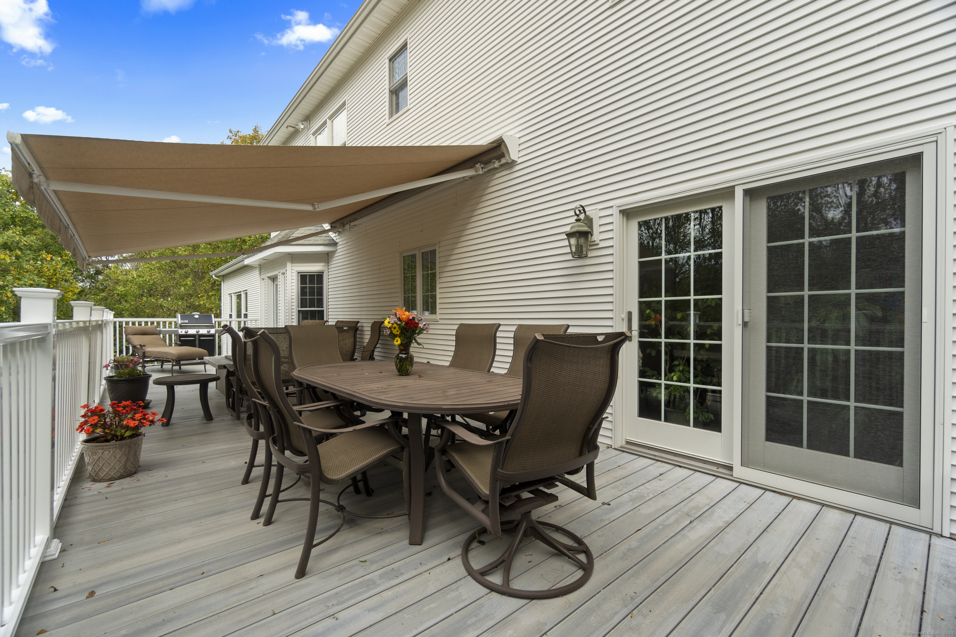 38 Sportsman Hill Road Madison, CT 06443 - Photo 37 of 40 a view of a deck patio and outdoor seating