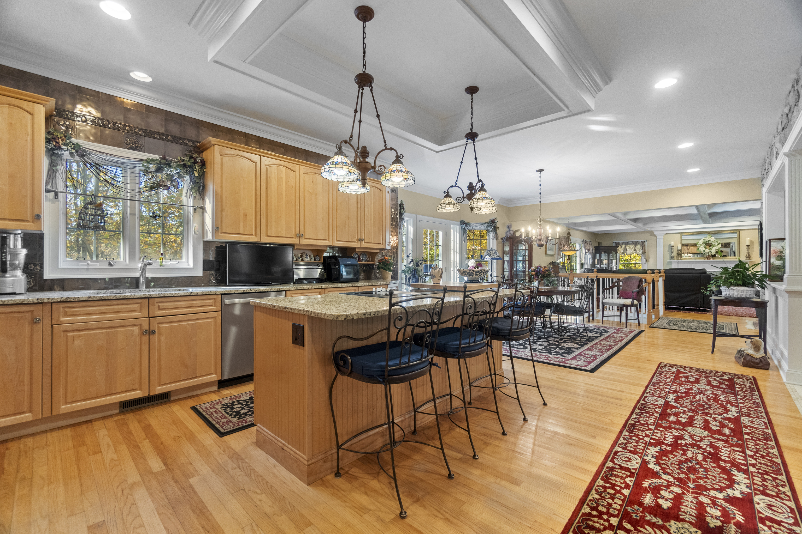 38 Sportsman Hill Road Madison, CT 06443 - Photo 5 of 40 a large kitchen with lots of counter space and windows