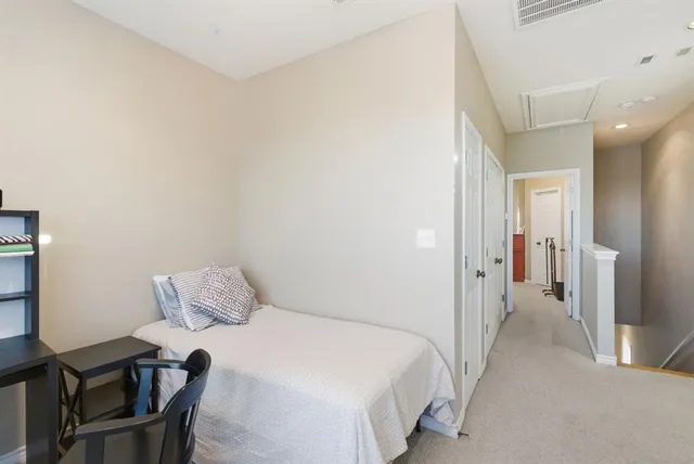 a view of a hallway with entryway