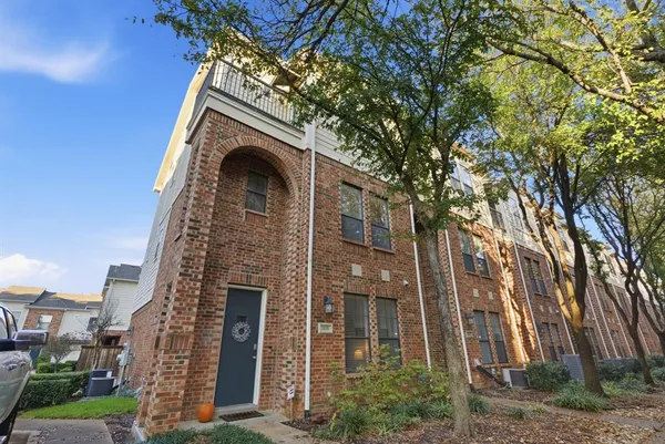 a view of a balcony with wooden fence and floor