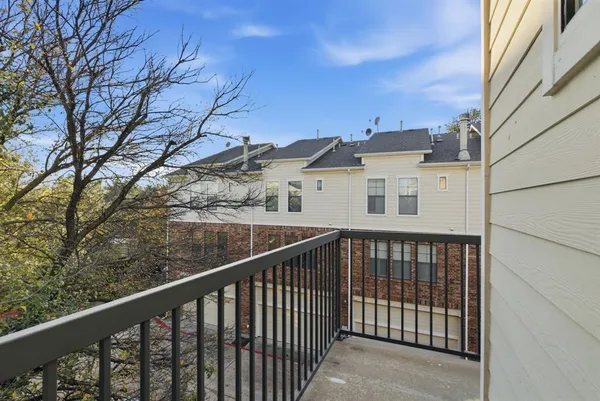 an aerial view of residential building and ocean
