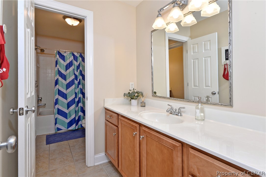 3165 Ridge Drive Toano, VA 23168 - Photo 27 of 41 Second floor bath with two vanity spaces.