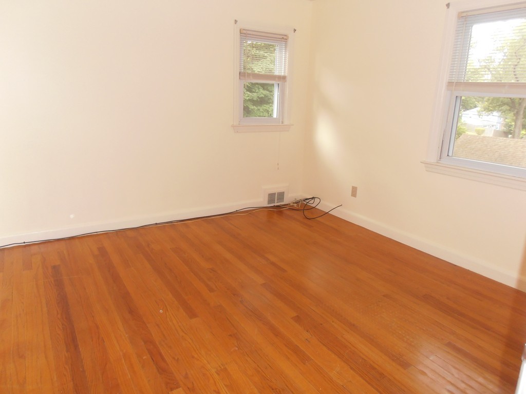 168 Emerson Street Springfield, MA 01118 - Photo 7 of 14 an empty room with windows