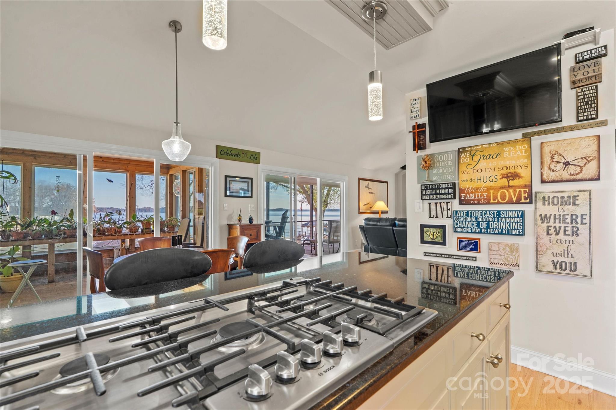 2488 Primm Road Denver, NC 28037 - Photo 16 of 48 a living room with furniture and a flat screen tv