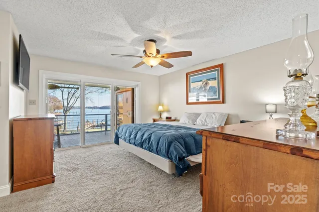 a bedroom with a bed and dresser