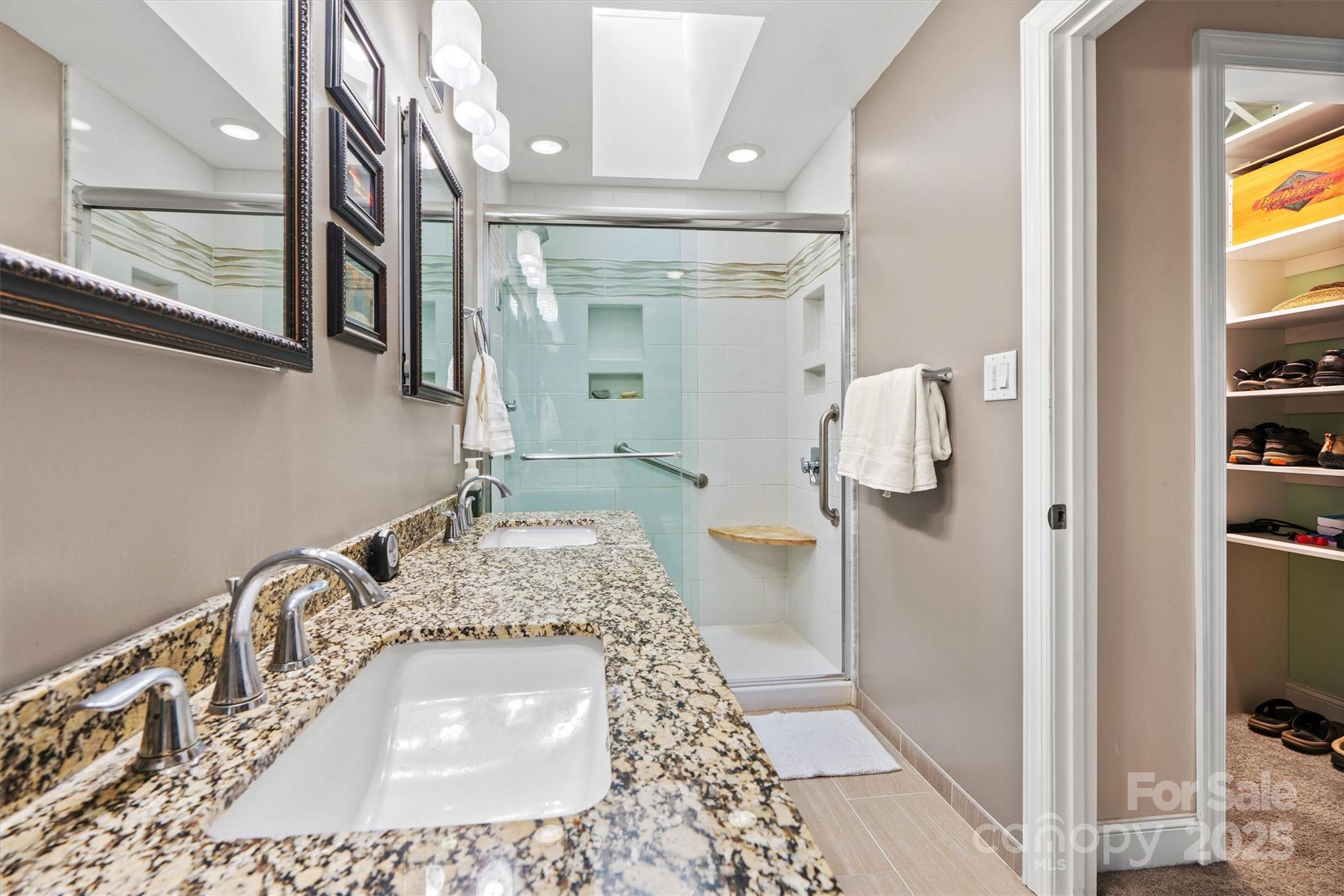 2488 Primm Road Denver, NC 28037 - Photo 24 of 48 a bathroom with a sink and a mirror