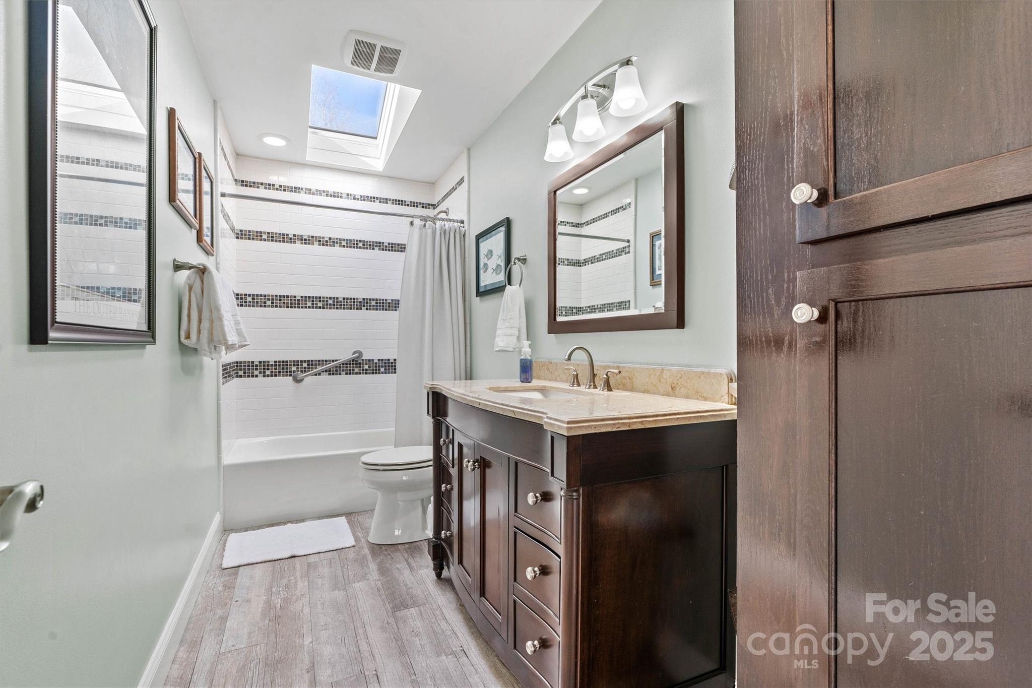 2488 Primm Road Denver, NC 28037 - Photo 27 of 48 a bathroom with a sink a toilet and shower