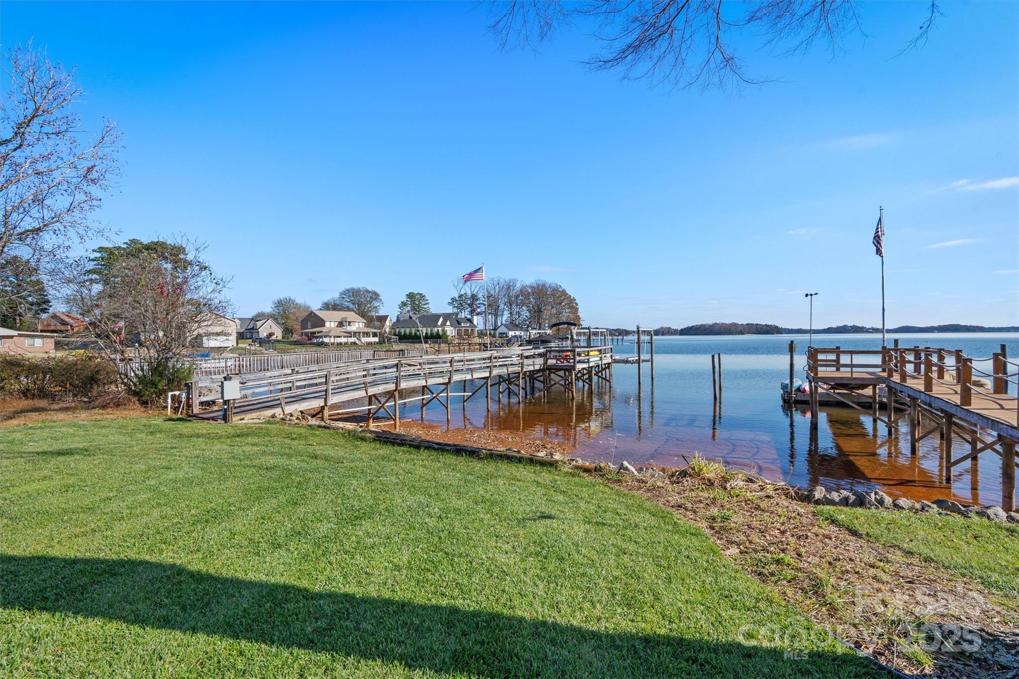 2488 Primm Road Denver, NC 28037 - Photo 40 of 48 a view of a house with a yard and sitting area