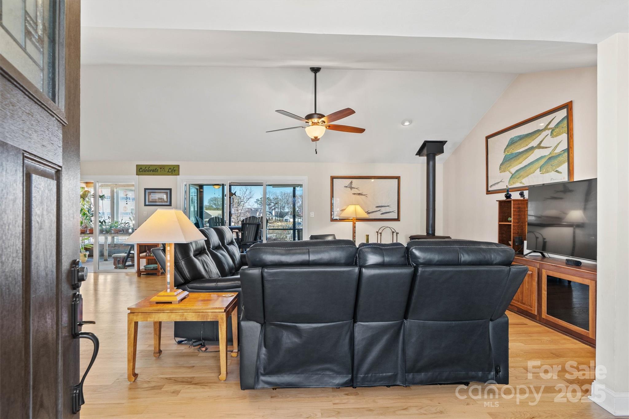 2488 Primm Road Denver, NC 28037 - Photo 8 of 48 a living room with furniture a table and chairs