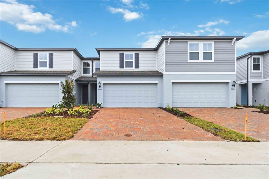 4571 Range Land Way St. Cloud, FL 34772 - Photo 33 of 43 front view of a house