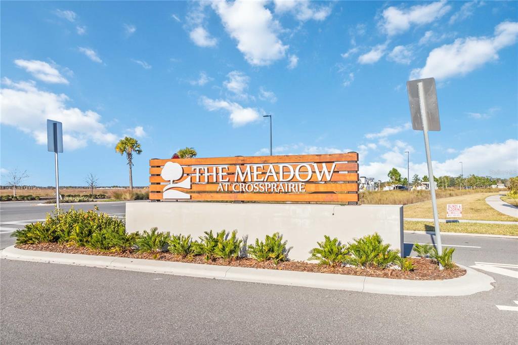 4571 Range Land Way St. Cloud, FL 34772 - Photo 34 of 43 a sign on the side of a building