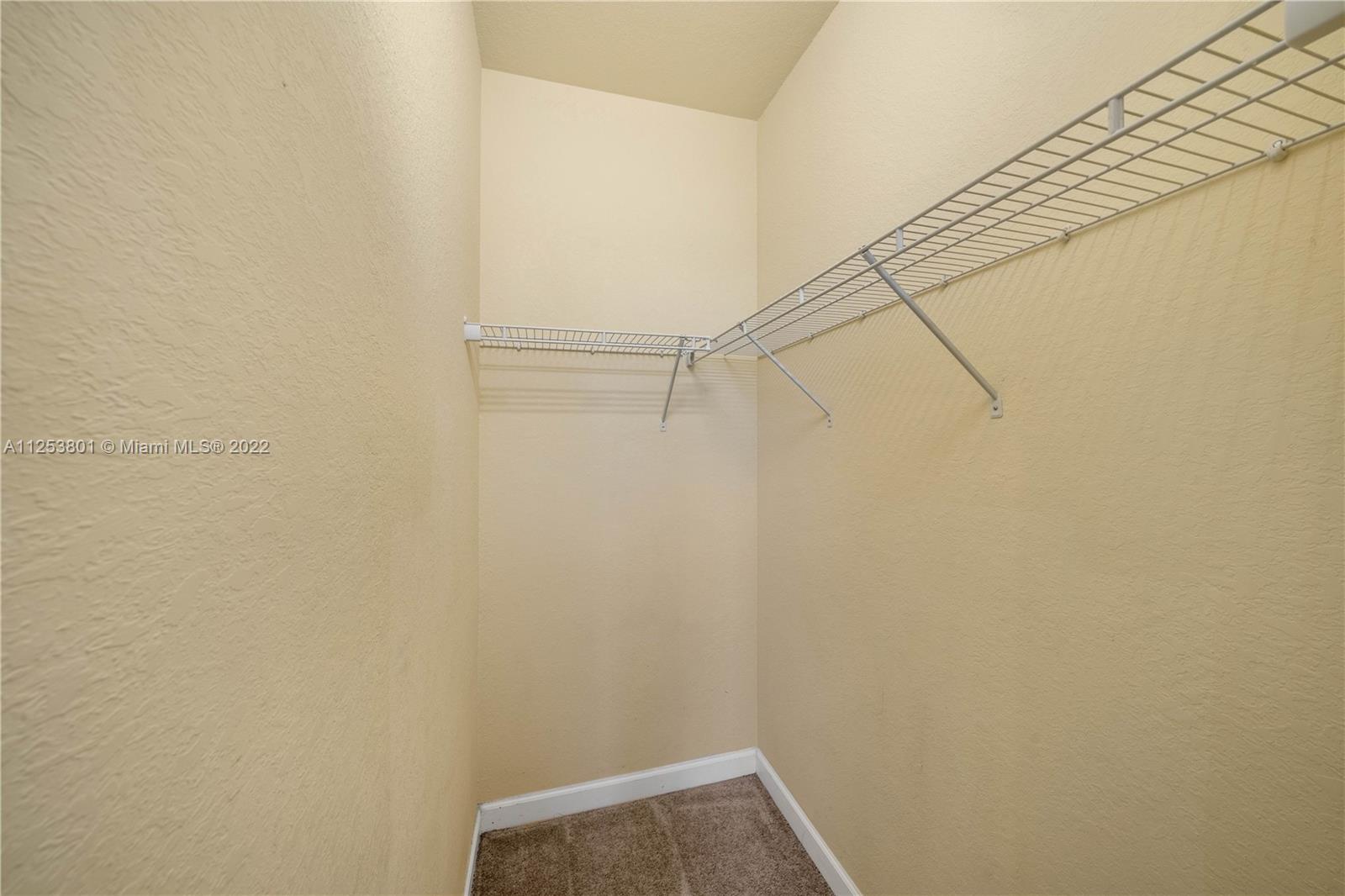 3366 West 90th Terrace, Unit 3366 Hialeah, FL 33018 - Photo 12 of 26 a view of small space with empty racks on the wall