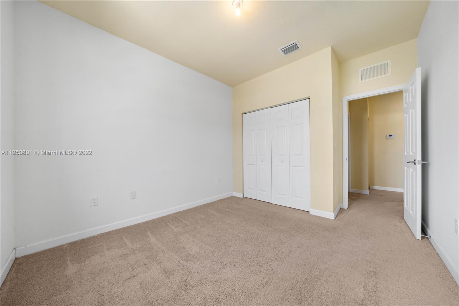 3366 West 90th Terrace, Unit 3366 Hialeah, FL 33018 - Photo 16 of 26 a view of an empty room