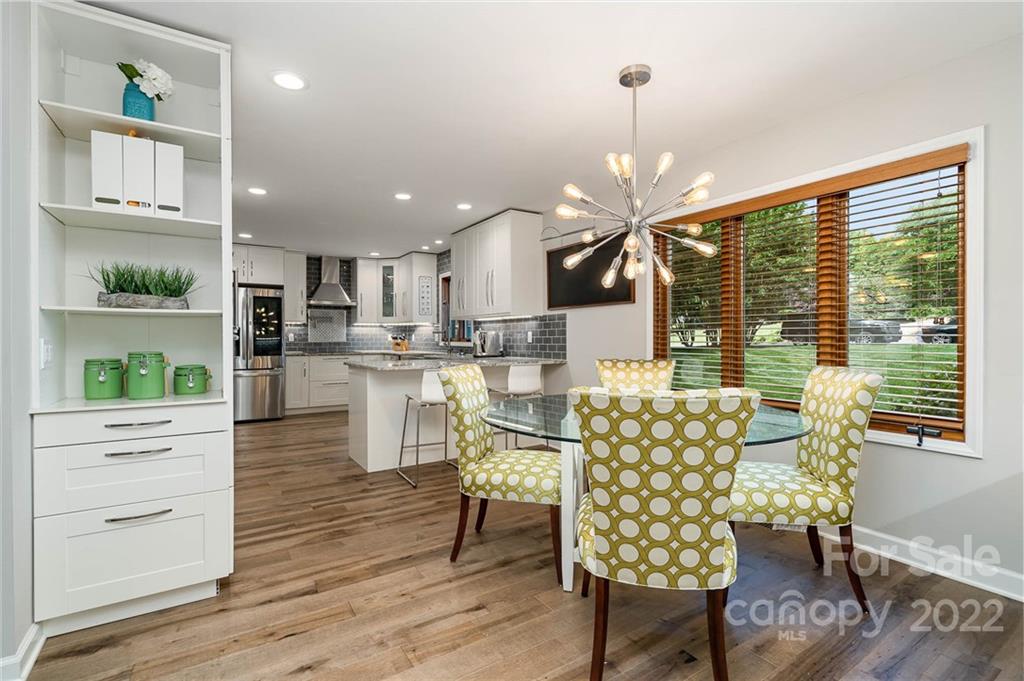 4525 Rounding Run Road Charlotte, NC 28277 - Photo 17 of 44 a living room with furniture and a large window