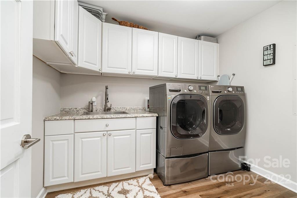 4525 Rounding Run Road Charlotte, NC 28277 - Photo 29 of 44 a utility room with sink dryer and washer