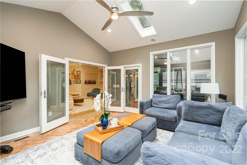 4525 Rounding Run Road Charlotte, NC 28277 - Photo 30 of 44 a living room with furniture and a flat screen tv