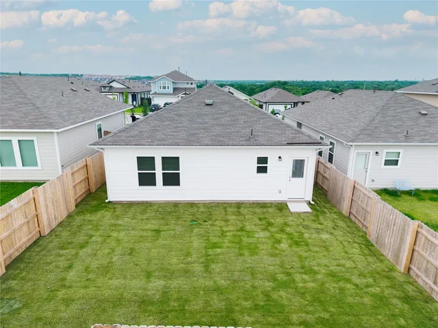a house view with a garden space