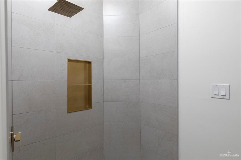 301 North 32nd Street Hidalgo, TX 78557 - Photo 13 of 22 a bathroom with a shower