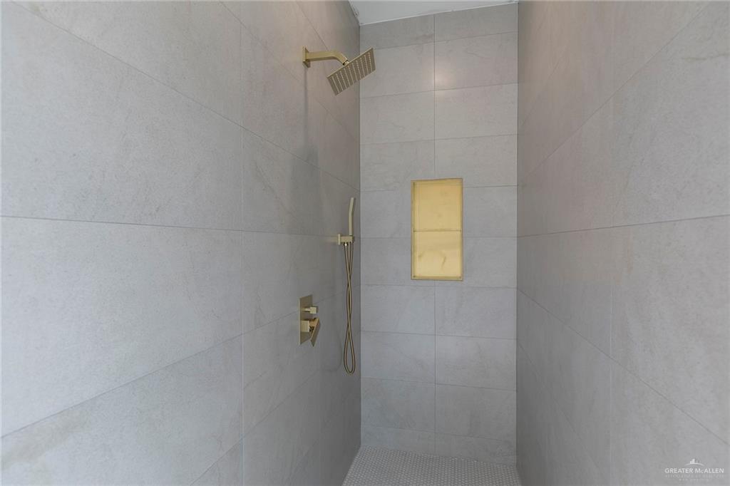 301 North 32nd Street Hidalgo, TX 78557 - Photo 8 of 22 a bathroom with a shower