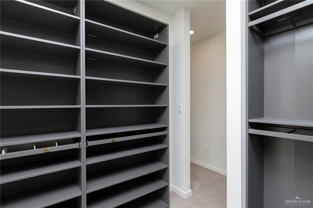 301 North 32nd Street Hidalgo, TX 78557 - Photo 10 of 22 a view of walk in closet with empty racks