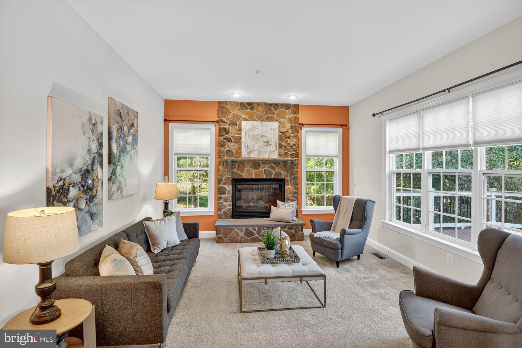 7809 Stanley Lane Severn, MD 21144 - Photo 11 of 30 Large family room with gas fireplace