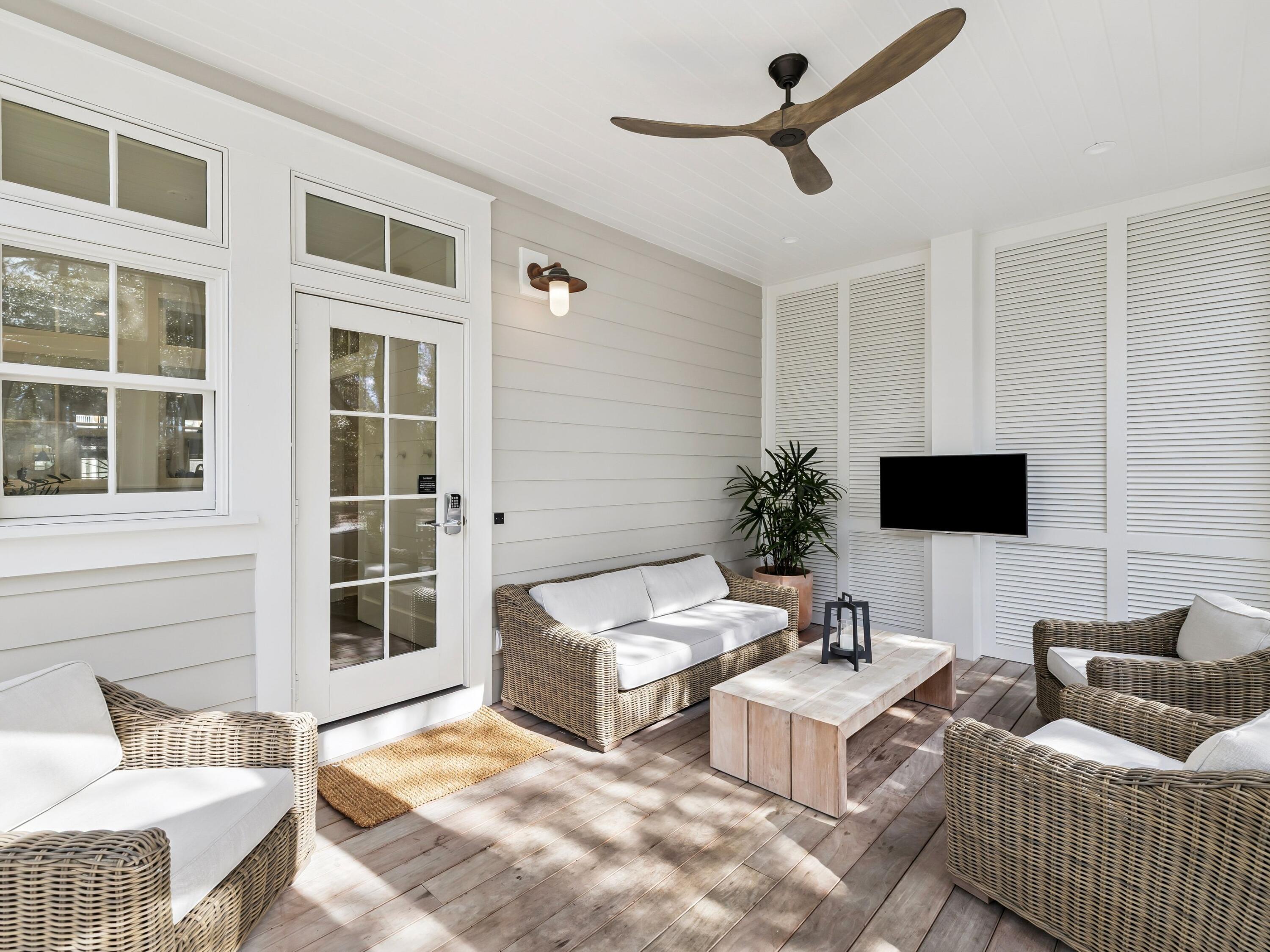 37 Winterberry Circle Santa Rosa Beach, FL 32459 - Photo 17 of 39 a living room with furniture and a flat screen tv