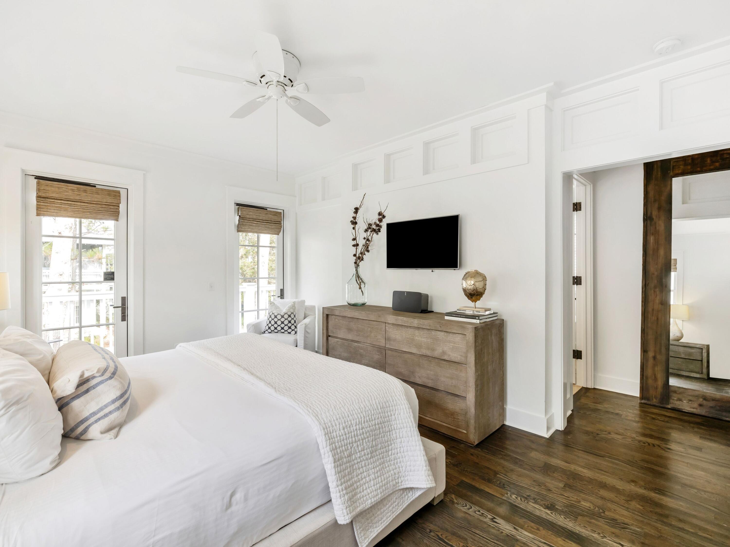 37 Winterberry Circle Santa Rosa Beach, FL 32459 - Photo 19 of 39 a bedroom with a bed and a flat screen tv