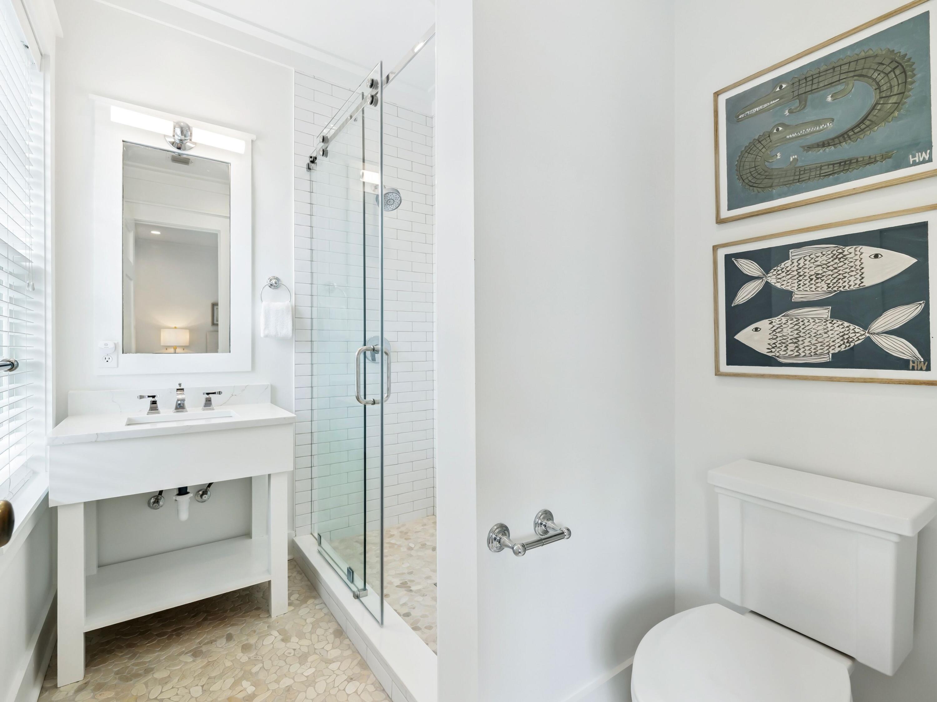 37 Winterberry Circle Santa Rosa Beach, FL 32459 - Photo 22 of 39 a bathroom with a toilet a sink and mirror