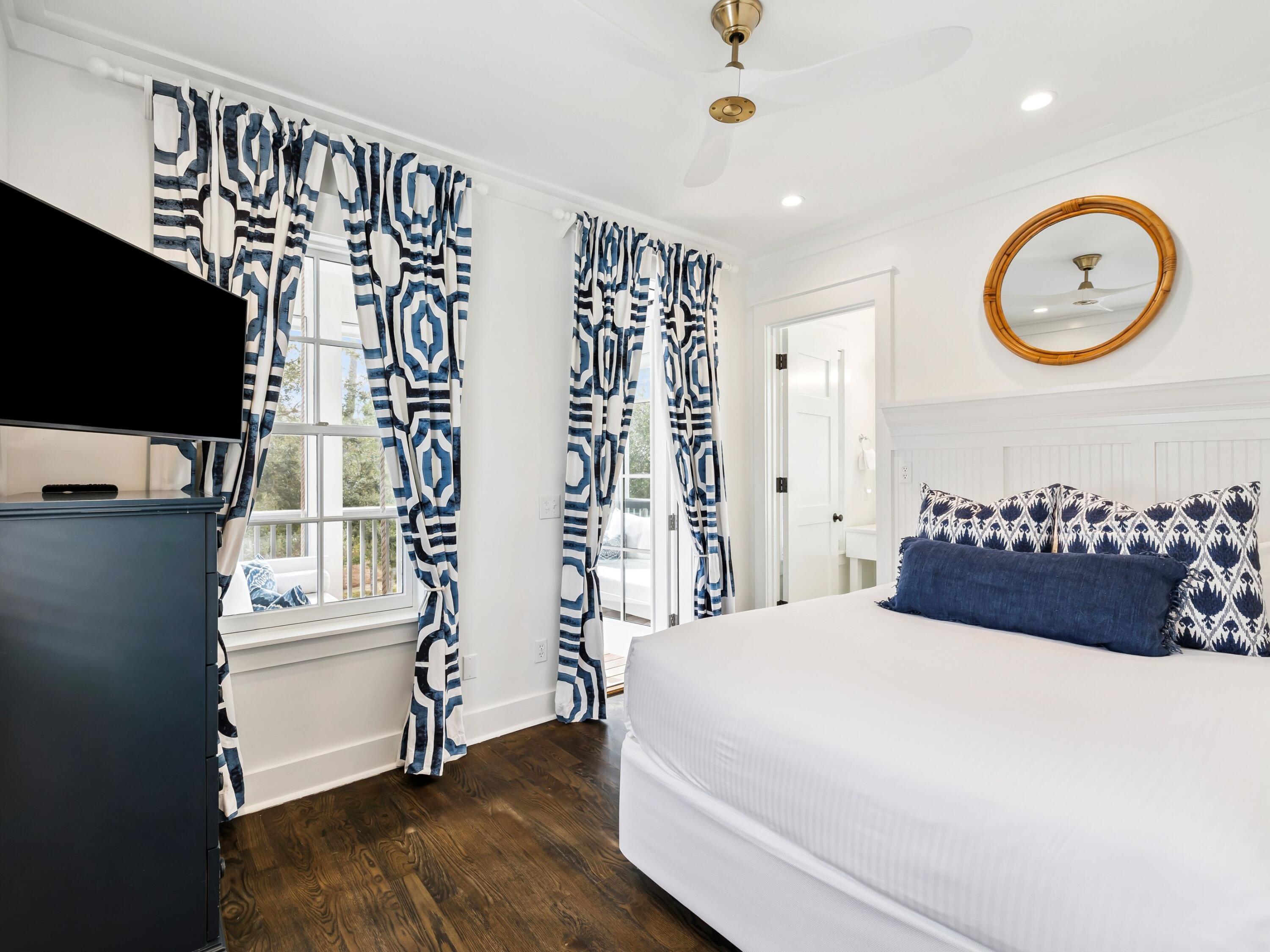 37 Winterberry Circle Santa Rosa Beach, FL 32459 - Photo 24 of 39 a bedroom with a bed and a flat screen tv
