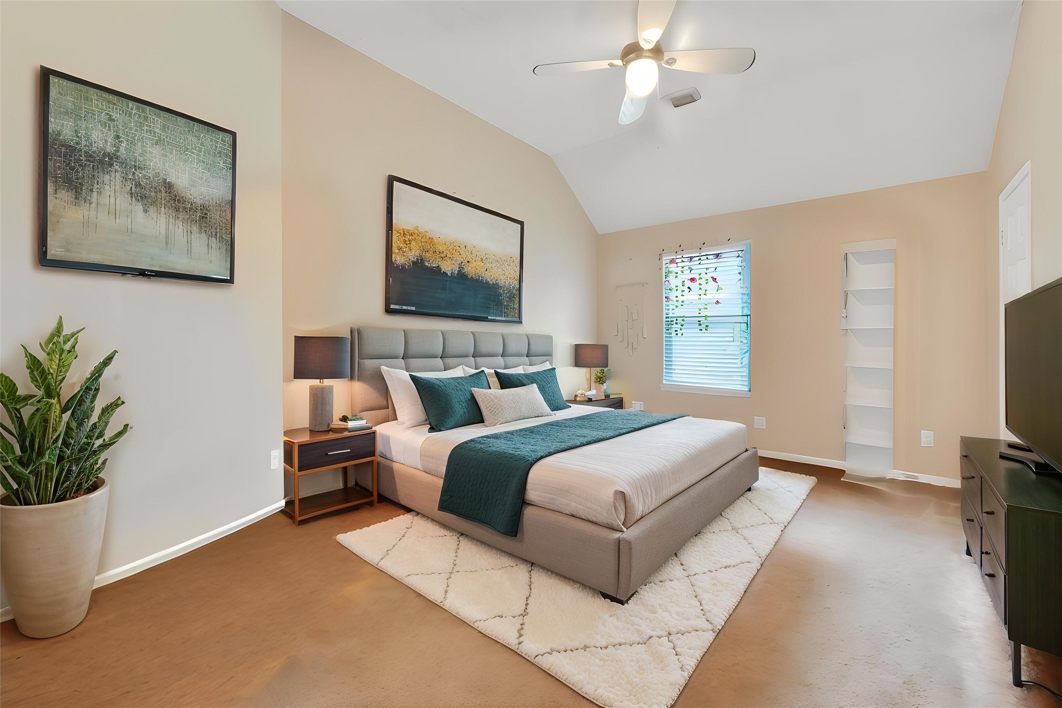 3203 Ruffin Green Court Fresno, TX 77545 - Photo 11 of 20 a bedroom with bed and a flat screen tv