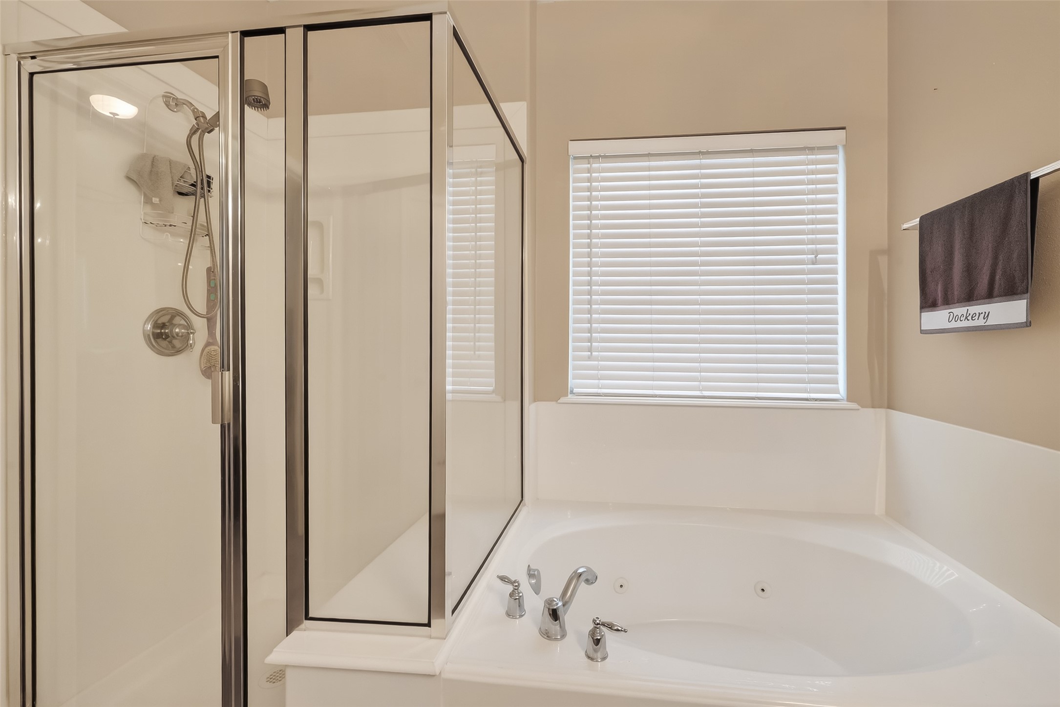 3203 Ruffin Green Court Fresno, TX 77545 - Photo 17 of 20 a bathroom with a bathtub and a shower