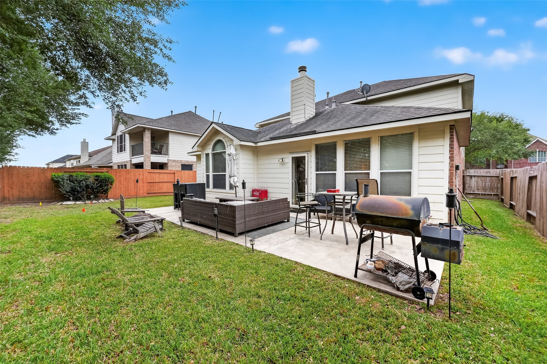 3203 Ruffin Green Court Fresno, TX 77545 - Photo 20 of 20 a backyard of a house with table and chairs