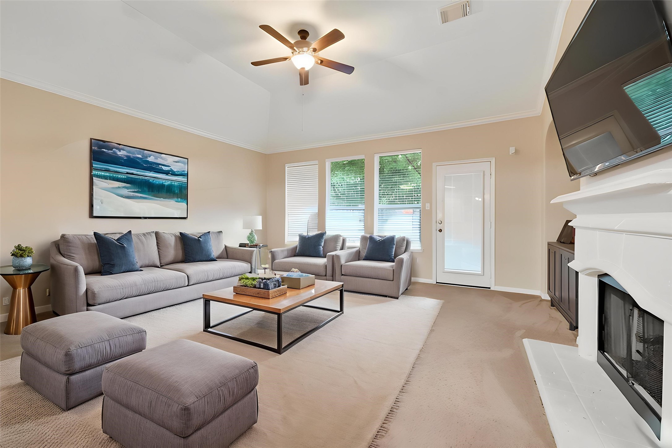 3203 Ruffin Green Court Fresno, TX 77545 - Photo 5 of 20 a living room with furniture a large window and a fireplace