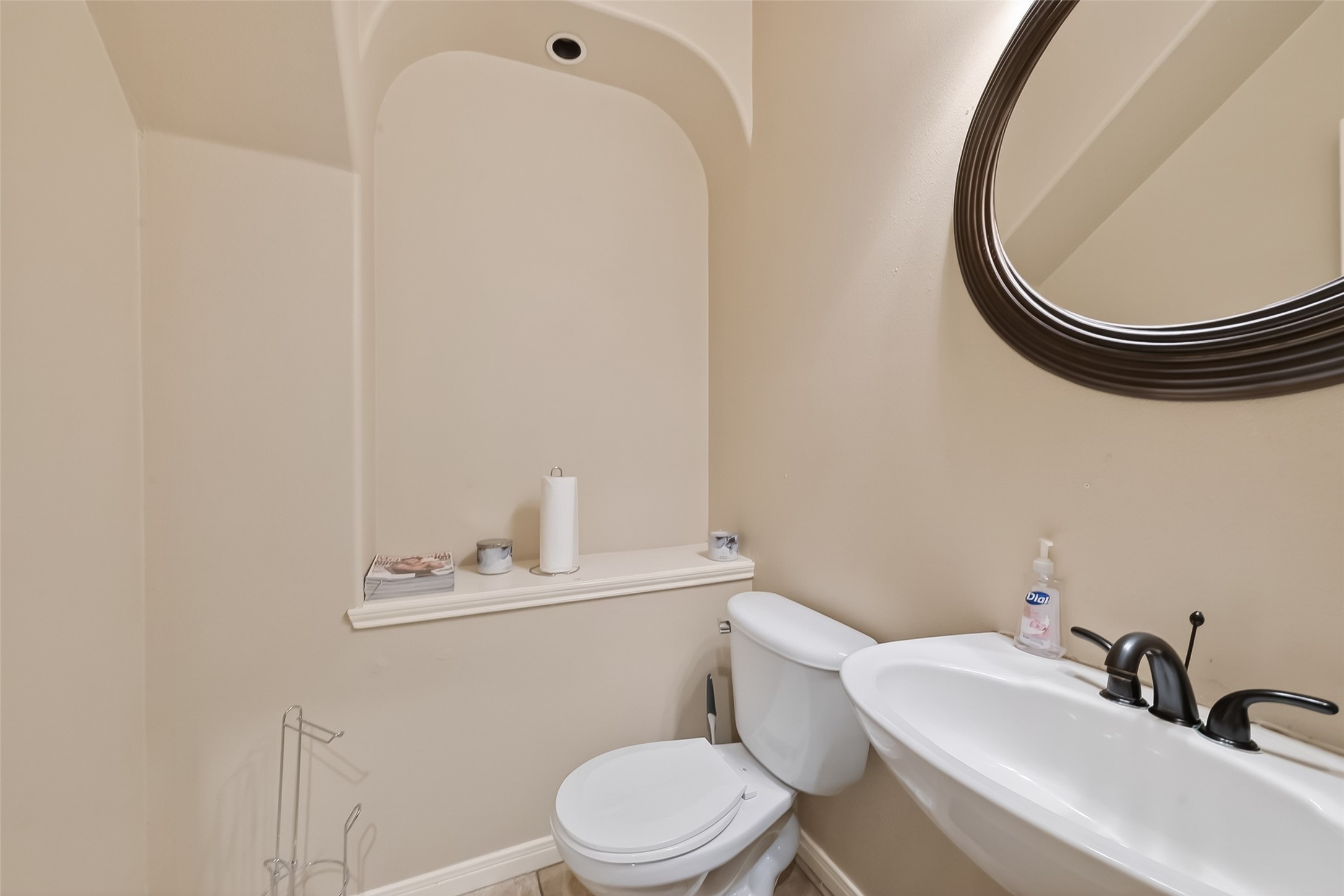 3203 Ruffin Green Court Fresno, TX 77545 - Photo 6 of 20 a bathroom with a sink a toilet and a mirror