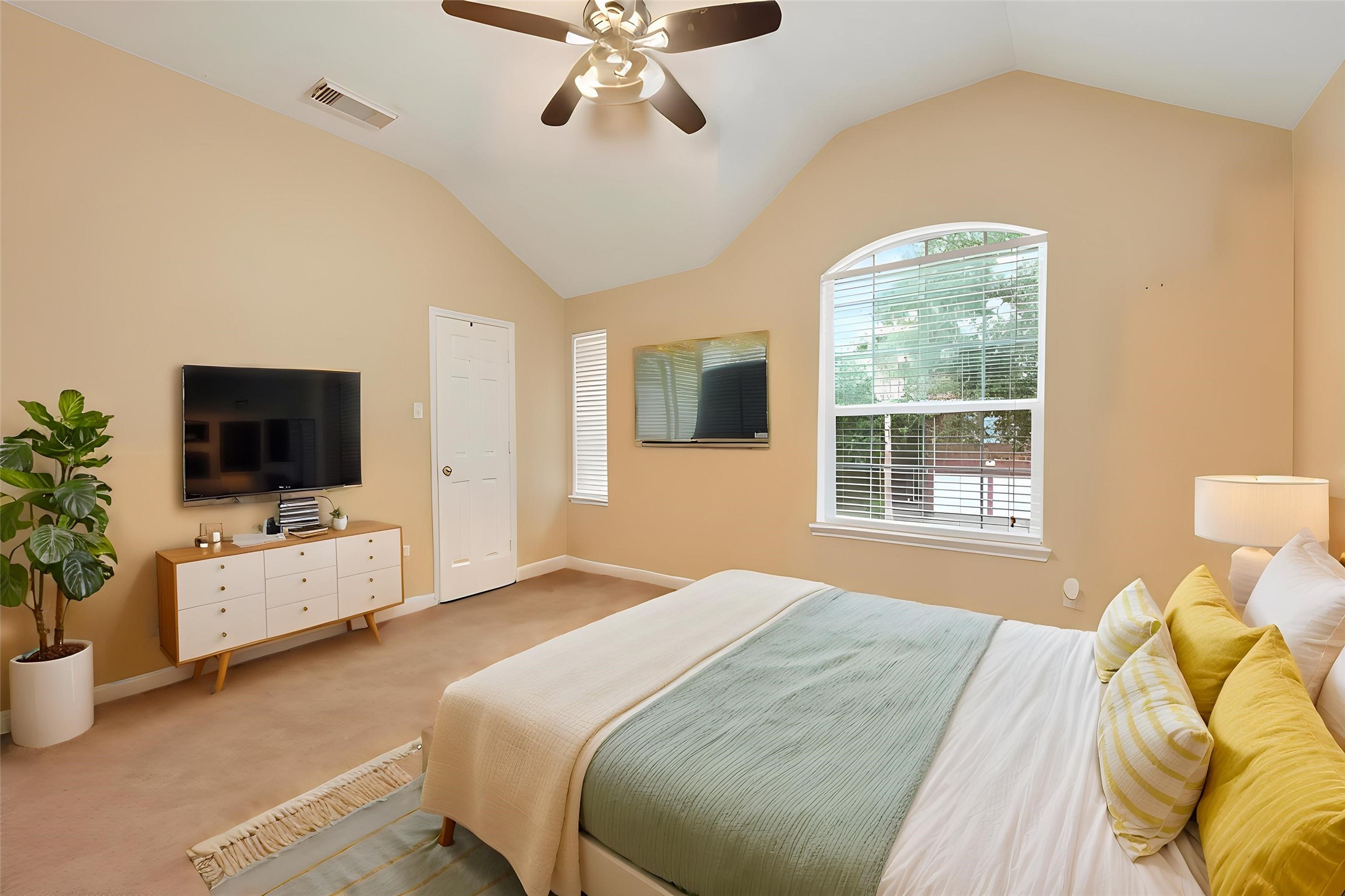 3203 Ruffin Green Court Fresno, TX 77545 - Photo 7 of 20 a bedroom with a bed and a flat screen tv