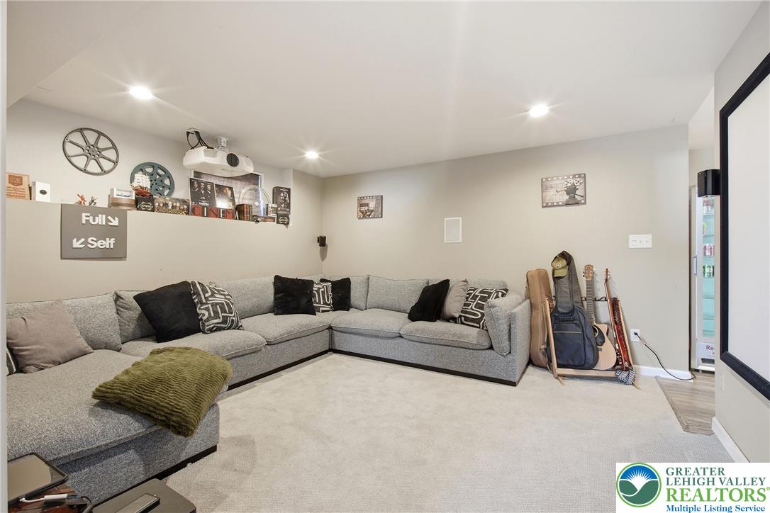 115 West Butternut Road Hellertown, PA 18055 - Photo 54 of 97 Recessed lighting illuminates this versatile basement, ideal for entertainment or relaxation.
