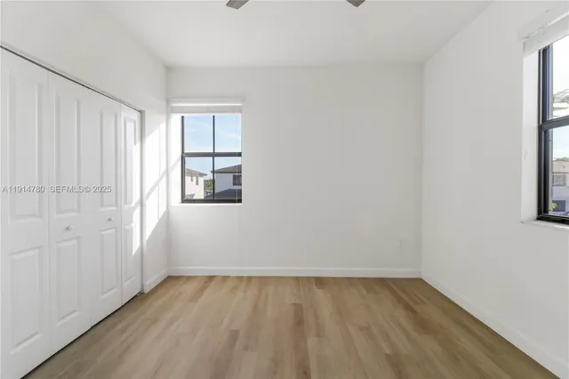 a bathroom with a sink toilet and vanity