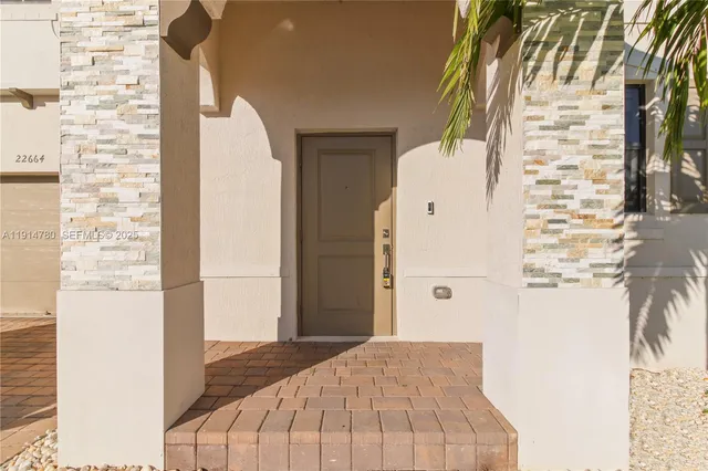 a view of a bedroom with bathroom