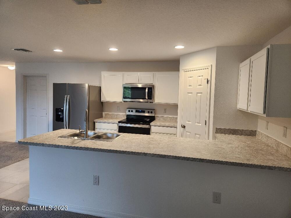 910 Carver Road Southeast Palm Bay, FL 32909 - Photo 3 of 4 20231116_113034_resized
