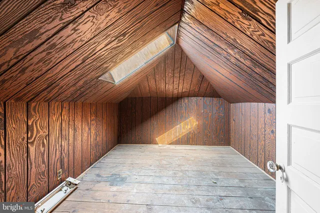 a view of entryway with stairs and wooden floor