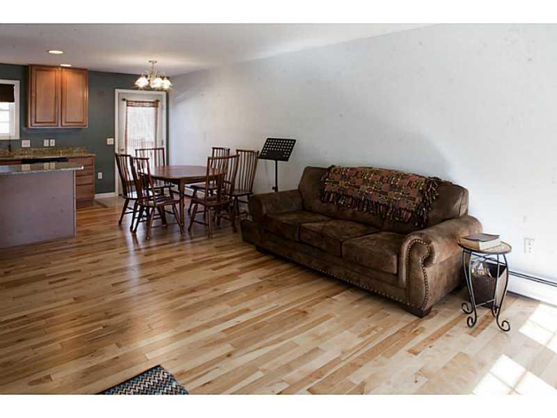 199 Bomarc Road, Unit 18 Bangor, ME 04401 - Photo 4 of 24 Living Room. Gleaming hardwood floors