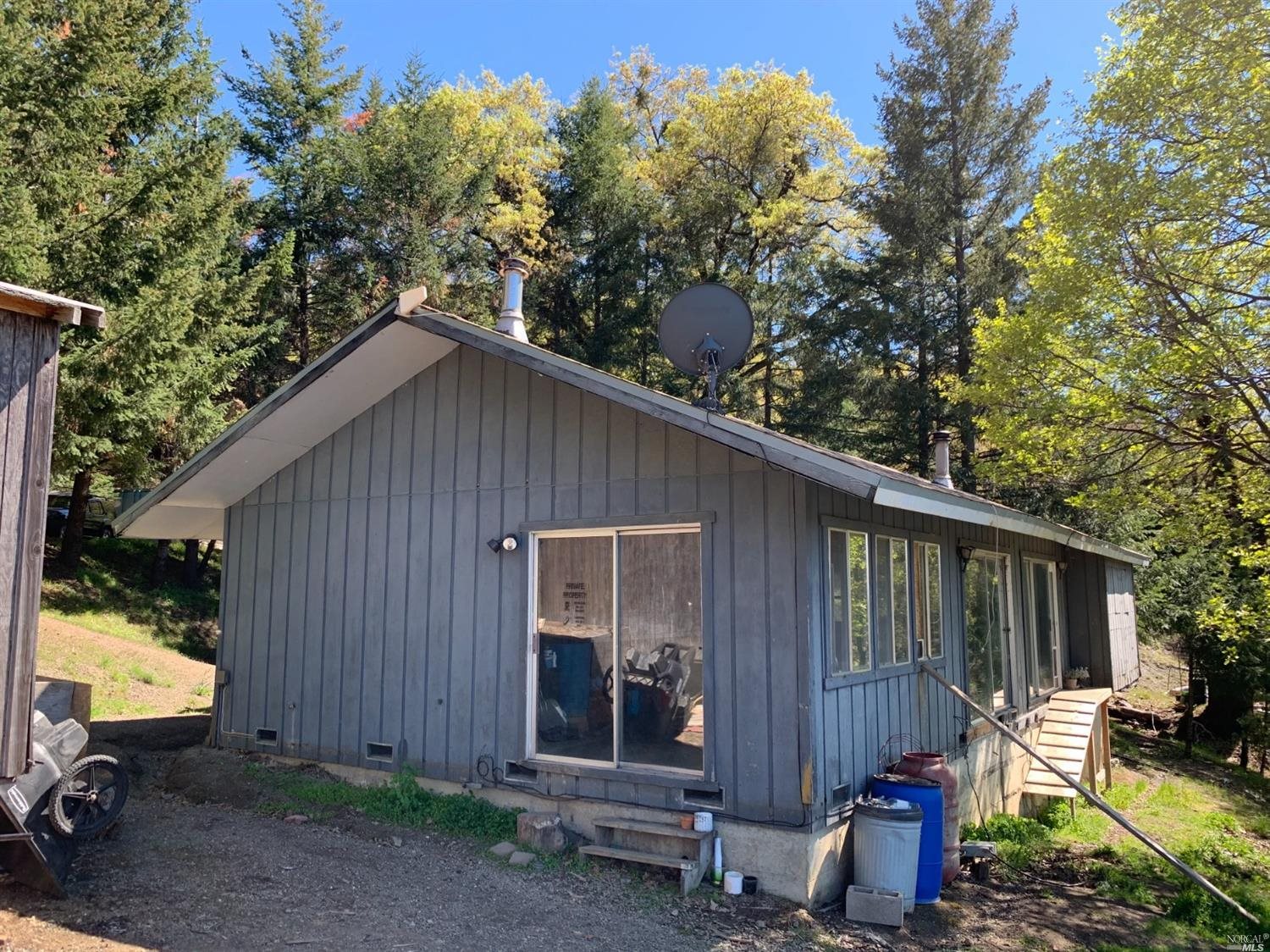 a house view with a backyard space