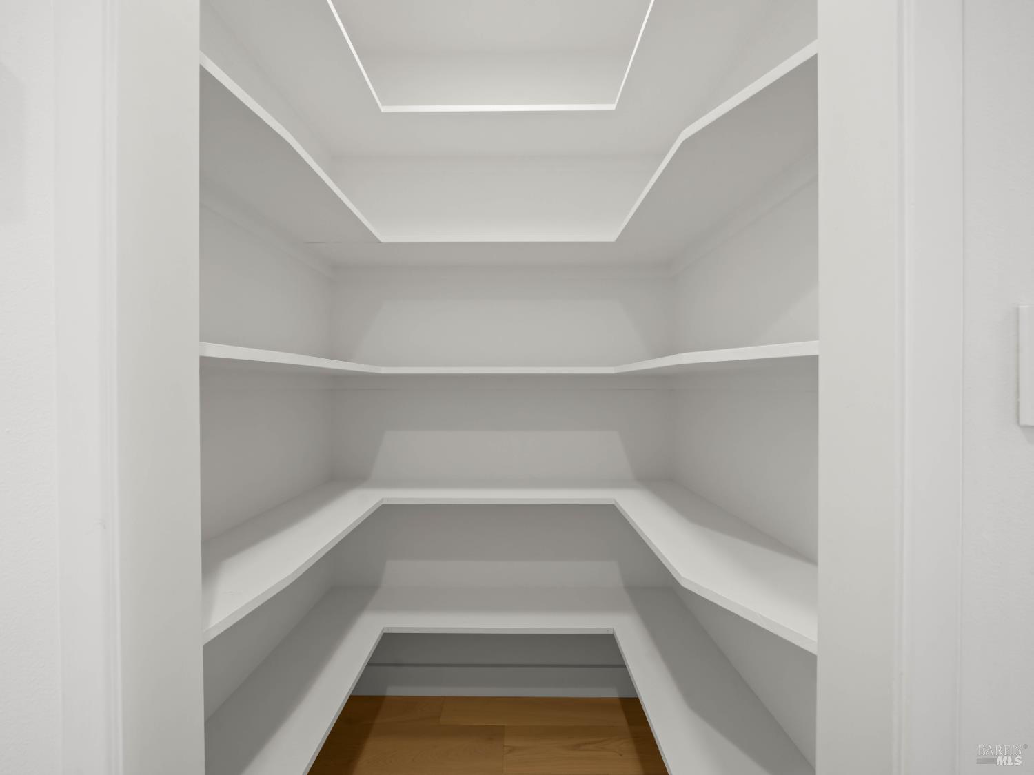 148 Dominican Drive San Rafael, CA 94901 - Photo 22 of 60 a view of walk in closet with empty racks